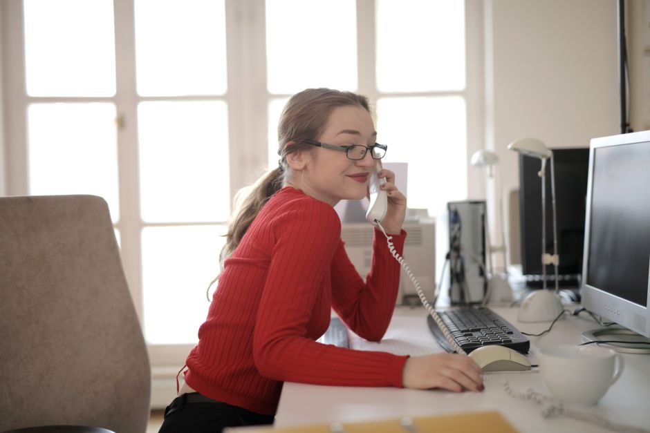 Borrower calling a lender from a desk phone